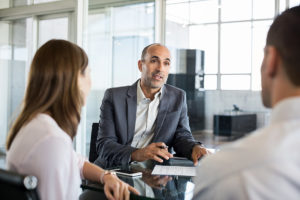 advisor-speaking-to-a-couple